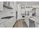 Beautiful kitchen with white cabinets, stainless steel appliances, double ovens and ample counter space for cooking at 3920 Maidstone Dr, Mount Pleasant, SC 29466