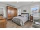 Comfortable bedroom with a cozy bed, charming bedside tables and an armoire at 3920 Maidstone Dr, Mount Pleasant, SC 29466