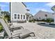 Beautiful patio area with lounge chairs and an outdoor dining space at 3920 Maidstone Dr, Mount Pleasant, SC 29466