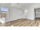 Bright, open living room featuring light wood floors, recessed lighting, and a built-in storage niche at 397 Parkdale Dr, Charleston, SC 29414