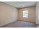 This carpeted bedroom has a window with natural light and neutral walls at 421 Peacock Ln, Summerville, SC 29486