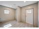 This is a bedroom with wood-look vinyl floors and access to an ensuite bathroom and walk-in closet at 421 Peacock Ln, Summerville, SC 29486