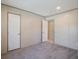 This bedroom with neutral walls and carpeted floors has two closets and an entryway at 421 Peacock Ln, Summerville, SC 29486