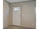 Close-up of the front door with decorative window and clean interior features at 421 Peacock Ln, Summerville, SC 29486