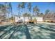 The exterior of the home features newly seeded lawn and two small wooden decks with stairs at 421 Peacock Ln, Summerville, SC 29486