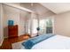 Bright bedroom with a vaulted ceiling, wood floors, and a large window at 4333 Cloudmont Dr, Hollywood, SC 29449