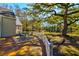 Inviting deck area with outdoor seating, perfect for enjoying the serene surroundings at 4333 Cloudmont Dr, Hollywood, SC 29449