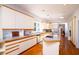 Spacious kitchen features stainless steel appliances, wood floors, and ample cabinet space at 4333 Cloudmont Dr, Hollywood, SC 29449