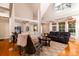 Comfortable living room open to dining area featuring a vaulted ceiling at 4333 Cloudmont Dr, Hollywood, SC 29449