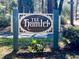 Neighborhood sign for 'The Hamlet' community with attractive landscaping and a welcoming entrance at 4333 Cloudmont Dr, Hollywood, SC 29449
