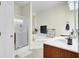 Bright bathroom featuring a tiled floor, a stand-up shower and separate soaking tub at 4610 Palm View Cir, North Charleston, SC 29418