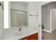 Bathroom featuring a large mirror and wooden vanity, providing ample counter and storage space at 4610 Palm View Cir, North Charleston, SC 29418
