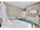 Bedroom featuring a white crib and dresser, creating a warm and inviting space for a new baby at 4610 Palm View Cir, North Charleston, SC 29418