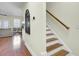 Hallway with staircase and view of living room at 4610 Palm View Cir, North Charleston, SC 29418