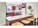 This kitchen features cherry cabinets, granite countertops, and stainless steel appliances at 4610 Palm View Cir, North Charleston, SC 29418