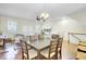 Open floor plan with dining area, living room, and a view to the staircase at 4610 Palm View Cir, North Charleston, SC 29418