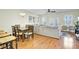 Open floor plan with dining area, living room, and barstool seating at the kitchen counter at 4610 Palm View Cir, North Charleston, SC 29418