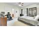 Spacious main bedroom featuring a large bed, walk out balcony and an attached bath at 4610 Palm View Cir, North Charleston, SC 29418