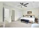 Spacious main bedroom with light carpet and large closets at 4610 Palm View Cir, North Charleston, SC 29418