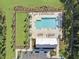 Aerial view of community pool, pool house, and surrounding landscaping at 500 W Respite Ln, Summerville, SC 29483