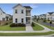 Attractive two-story home featuring a cozy covered porch, blue shutters, and beautifully maintained green lawn at 500 W Respite Ln, Summerville, SC 29483