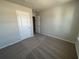 A bright bedroom featuring neutral walls and plush carpeting throughout at 5118 Double Eagle Lp, Summerville, SC 29485