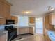 Efficient kitchen boasting wood cabinets, modern appliances, and a functional layout at 5181 Dr Taylor Rd, Adams Run, SC 29426