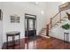 Elegant foyer with hardwood floors, staircase, and stylish decor, creating a grand entrance at 536 Island Walk West, Mount Pleasant, SC 29464