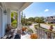 Inviting front porch with comfortable seating and views of the landscaped front yard at 536 Island Walk West, Mount Pleasant, SC 29464