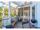 Outdoor kitchen featuring a stainless steel grill, prep area, and patio seating at 536 Island Walk West, Mount Pleasant, SC 29464