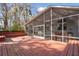 The spacious screened-in porch provides an outdoor oasis and deck with hot tub to enjoy at 5429 Roxbury Dr, North Charleston, SC 29418