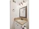 Bathroom featuring granite counters, framed mirror, and bronze hardware at 5429 Roxbury Dr, North Charleston, SC 29418