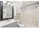 Updated bathroom with a shower and tub combination and a large vanity with a framed mirror at 5429 Roxbury Dr, North Charleston, SC 29418