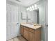 Well-lit bathroom features a single sink vanity and a neutral color scheme at 700 Daniel Ellis Dr # 11202, Charleston, SC 29412