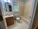 Bathroom with updated vanity, toilet, and tub/shower combination, and window with natural light at 827 Duck Hawk Retreat, Charleston, SC 29412