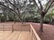 The wooden deck provides ample space for outdoor entertaining and relaxation at 827 Duck Hawk Retreat, Charleston, SC 29412