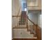 Stairway with carpeted steps and wooden railings leading to the second floor of the home at 827 Duck Hawk Retreat, Charleston, SC 29412