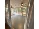 Sunroom with ceiling fans and windows at 827 Duck Hawk Retreat, Charleston, SC 29412