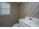 Bathroom features vanity and window with blinds at 8396 Waltham Rd, North Charleston, SC 29406