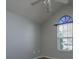 Bedroom with a ceiling fan and a window providing natural light at 8396 Waltham Rd, North Charleston, SC 29406