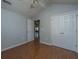 Bedroom featuring wood floors and white doors, creating a bright, airy space at 8396 Waltham Rd, North Charleston, SC 29406