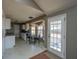Kitchen with a dining nook and access to the backyard, showcasing functional design at 8396 Waltham Rd, North Charleston, SC 29406