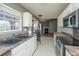 Charming kitchen featuring white cabinets and stainless-steel appliances at 8396 Waltham Rd, North Charleston, SC 29406