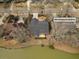 Aerial view of 8757 E Fairway Woods Circle with a backyard overlooking a scenic pond at 8757 E Fairway Woods Dr, North Charleston, SC 29420