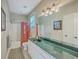 Hall bath showcasing an eye-catching green countertop, framed wall art, and shower-tub combo at 8757 E Fairway Woods Dr, North Charleston, SC 29420