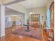 Spacious foyer with hardwood floors and view to the living and dining areas at 8757 E Fairway Woods Dr, North Charleston, SC 29420