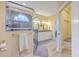 Elegant bathroom featuring dual sinks and a glass shower with a rainfall shower head at 8757 E Fairway Woods Dr, North Charleston, SC 29420