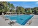 The pool area features swimming lanes, diving platforms, and ample seating for residents to relax and enjoy at 8757 E Fairway Woods Dr, North Charleston, SC 29420