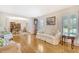 Cozy living room with hardwood floors, white furniture, and elegant decor at 927 Preston Rd, Charleston, SC 29412