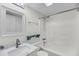 Bright white bathroom with shower and vanity with granite countertop at 1042 Planters Pl, Mount Pleasant, SC 29464